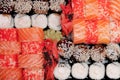 Overhead japanese sushi food. Rolls with tuna, salmon, shrimp, crab and avocado. Top view of assorted sushi, all you can eat menu Royalty Free Stock Photo