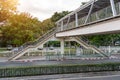 Overhead pedestrian crossing view of the stairs above the highway city road.