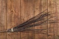 An overhead photo of a handmade broom with copy space