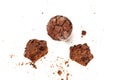 An overhead photo of messy chocolate muffins with crumbs, shot from above