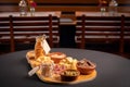 Delicious Dutch cheese board with various delicacies Royalty Free Stock Photo