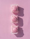 Food : Overhead of pink iced sponge cakes on a pink background. 7