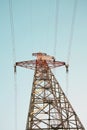 Overhead power transmission line tower with strange concrete foundation during construction. High voltage electric pole Royalty Free Stock Photo