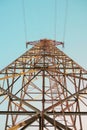 Overhead power transmission line tower with strange concrete foundation during construction. High voltage electric pole. Royalty Free Stock Photo