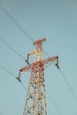 Overhead power transmission line tower with strange concrete foundation during construction. High voltage electric pole Royalty Free Stock Photo