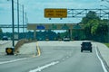 Overhead road direction signs found on the approach to toll plaza`s