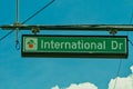 Overhead road sign indicating International Drive