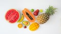 Overhead shot of assortment of exotic fruits isolated on white background