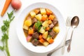 overhead shot of beef stew with carrots and potatoes