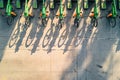 Overhead shot of a bike-sharing station with bicycles. Copy space