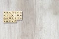Overhead shot of board game cubes on a wooden surface Royalty Free Stock Photo