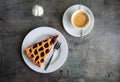 Overhead shot of a cherry pie and a cup of coffee on a table, Limburg, The Netherlands