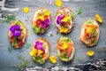 overhead shot of colorful mixed vegetable bruschettas