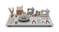 Handicraft Workspace with Sculpting Tools Sewing Machines and Thread Spools on Work Table Featuring a Clay Sculpture Royalty Free Stock Photo