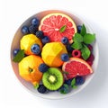 Overhead Shot of Fresh Fruit Arrangement in White Bowl on White Surface Royalty Free Stock Photo