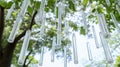 Overhead shot of garden wind chimes, set against a white background, with precise details. Royalty Free Stock Photo
