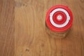 An overhead shot of a glass jar containing water kefir and sealed with a bright red fermentation lid indicating the current date