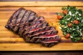 an overhead shot of a grilled sirloin steak on a board Royalty Free Stock Photo