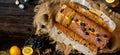 Overhead shot of homemade tasty lemon baked cake with blueberries on paper and sackcloth Royalty Free Stock Photo