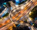 an overhead shot of an intersection at night time with many cars driving and traffic Royalty Free Stock Photo