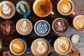 overhead shot of latte art designs in various cups