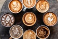 overhead shot of latte art designs in various cups