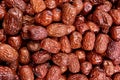 Overhead shot of lots of tasty nutritious red jujube fruits