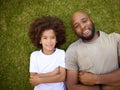 Overhead Shot Of Loving Father And Son Lying On Grass Together Royalty Free Stock Photo