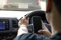 Overhead shot a Man using mobile phone while driving a car, Mode Royalty Free Stock Photo