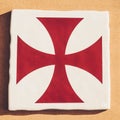 Overhead shot of the medieval Crusade flag painted on a white square tile