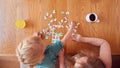 Overhead Shot Of Mother And Daughter Sitting At Table At Home Doing Jigsaw Puzzle Together Royalty Free Stock Photo