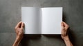 Overhead Shot: Open Blank Notebook Held by Hands Royalty Free Stock Photo