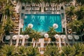 An overhead shot of a poolside lounge area with palm trees, cabanas, and people relaxing in stylish swimsuits, evoking the