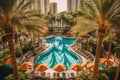An overhead shot of a poolside lounge area with palm trees, cabanas, and people relaxing in stylish swimsuits, evoking the