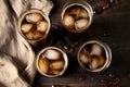 an overhead shot of root beer in multiple glasses