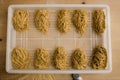 Overhead shot of rows of freshly made pasta. Royalty Free Stock Photo