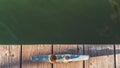Overhead shot of Rusting mooring cleat on dock with copy space Royalty Free Stock Photo