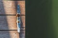 Overhead shot of Rusting mooring cleat on dock with copy space Royalty Free Stock Photo