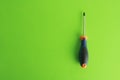 Overhead shot of a screwdriver tipped star, orange blue and black