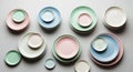 Pastel Dinnerware Sets on Gray Background Royalty Free Stock Photo