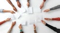 Hands Reaching for Blank Papers on White Surface Royalty Free Stock Photo