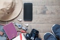 Overhead shot of travel items and accessories with mobile device Royalty Free Stock Photo