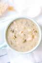 Overhead shot of a white bean soup in blue bowl Royalty Free Stock Photo