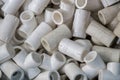 Overhead shot of white plastic fittings under the light Royalty Free Stock Photo