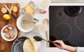 Overhead Shot Of Woman In Kitchen Serving Pancakes Or Crepes For Pancake Day Royalty Free Stock Photo