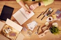 Overhead Shot Of Woman Running Online Business Making Candles At Home Writing To Do List Royalty Free Stock Photo