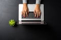 Overhead shot of woman working on laptop Royalty Free Stock Photo