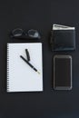 Spectacles, organizer, pen, mobile phone and wallet on background Royalty Free Stock Photo