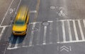 Overhead street view of yellow taxi cab in New York City Royalty Free Stock Photo