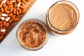 overhead view of almond butter jar and two slices of toasted bread Royalty Free Stock Photo